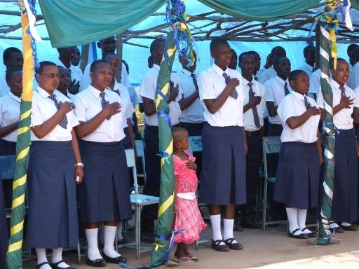 School song sung by Form Four Graduates (note preschooler copying the big kids!), ndutu